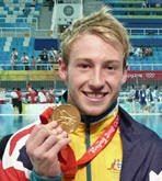 Matthew Mitcham earns gold, gay story snubbed by NBC