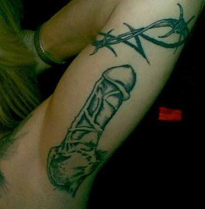 Cock tattoo on arm