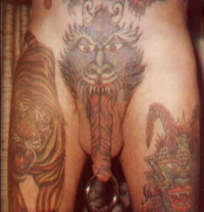Monster and demon tattoo on penis