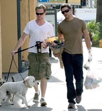 Neil Patrick Harris and partner walking dog